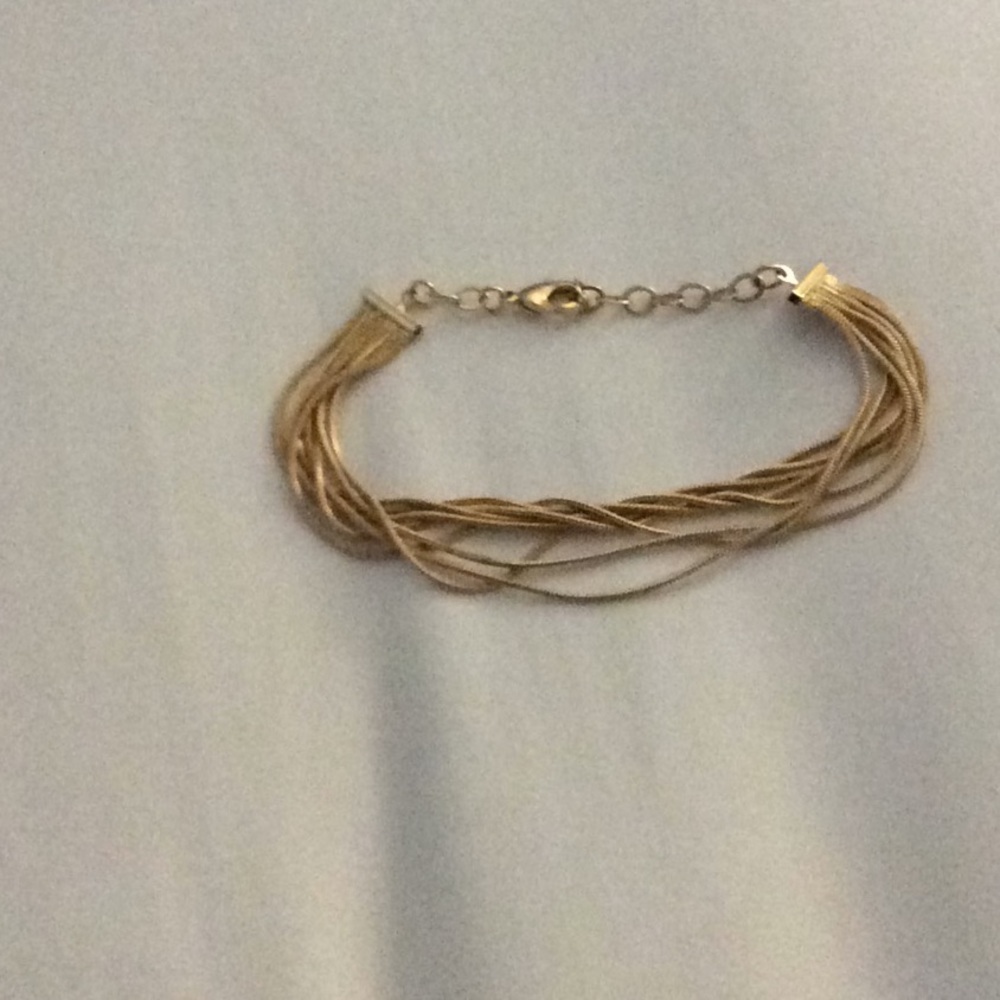 Gold bracelet 8 strands.adjustble